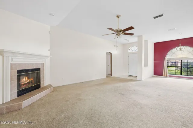 a kitchen with a sink stove and refrigerator