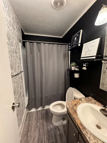 an empty room with closet area