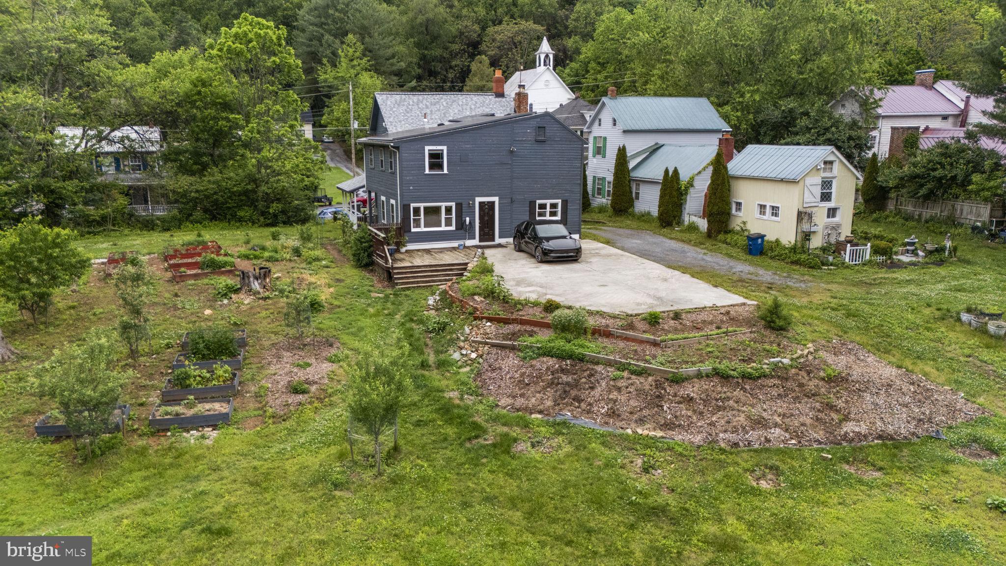 26001 Frederick Road Clarksburg, MD 20871 - Photo 32 of 46 a aerial view of a house with a yard