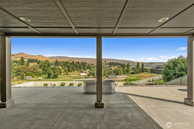 a view of a terrace with a city view