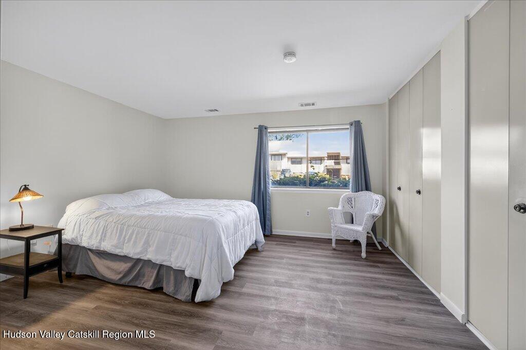 6 Knights Bridge, Unit B Poughkeepsie, NY 12603 - Photo 8 of 20 a bedroom with a bed and a window