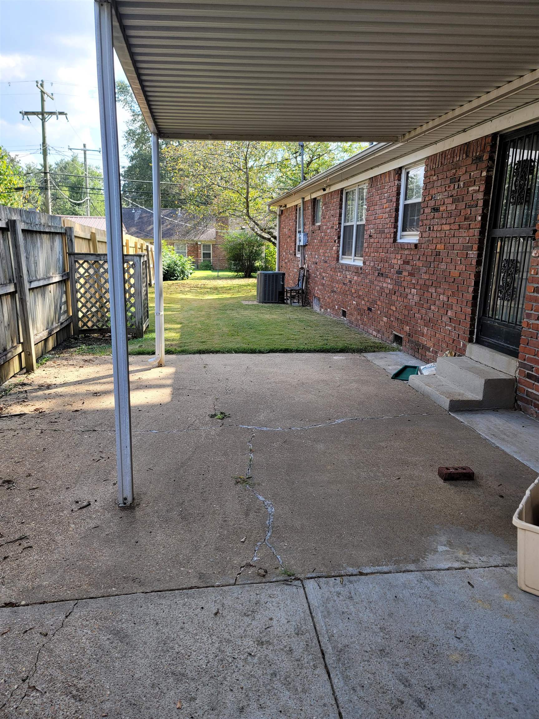 1522 Hayne Road Memphis, TN 38119 - Photo 23 of 25 a view of a house with backyard and porch