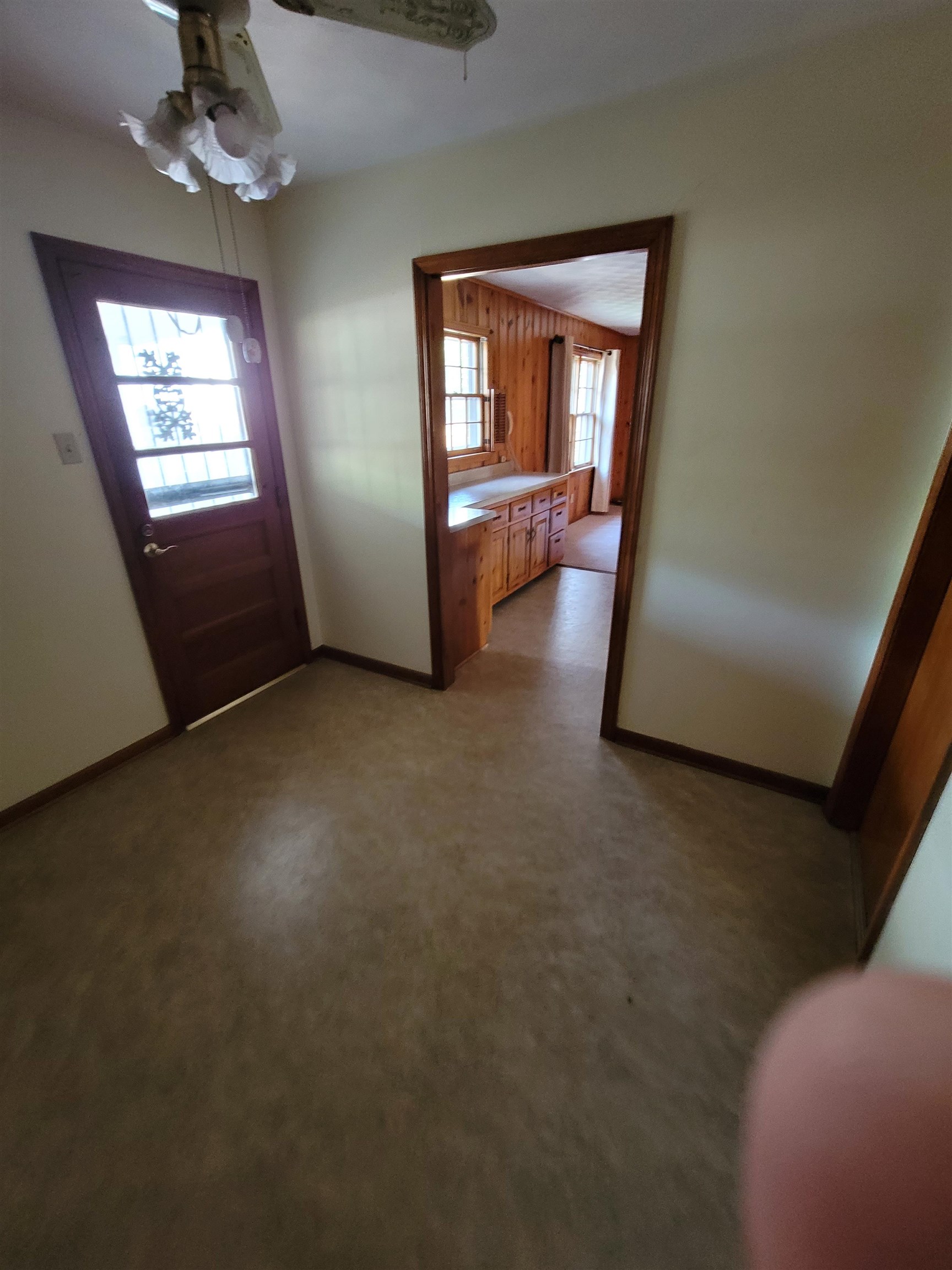 1522 Hayne Road Memphis, TN 38119 - Photo 9 of 25 an empty room with a fireplace and windows