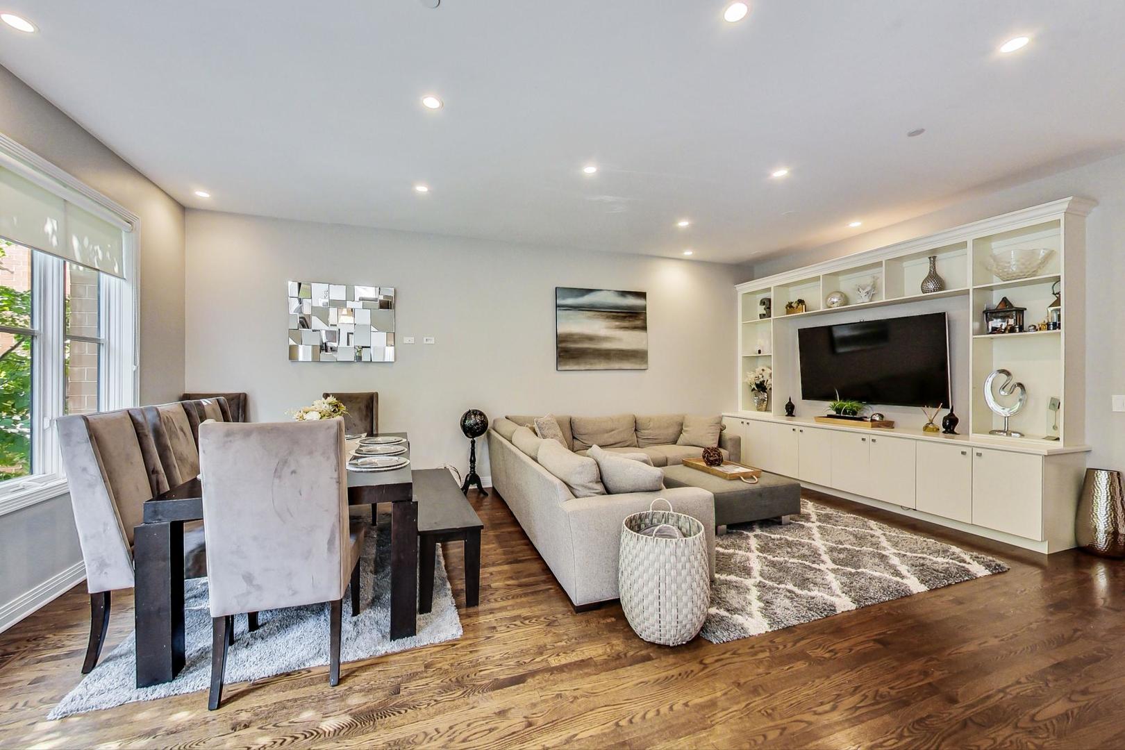 1137 West Monroe Street Chicago, IL 60607 - Photo 6 of 33 a living room with furniture and a flat screen tv