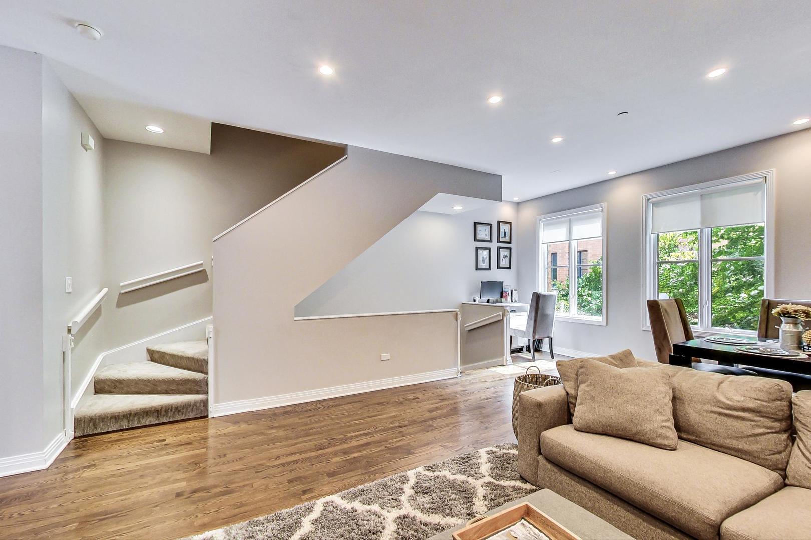 1137 West Monroe Street Chicago, IL 60607 - Photo 7 of 33 a living room with furniture and a large window