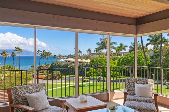 a balcony with furniture