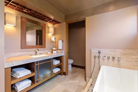 a bathroom with a bathtub and a sink