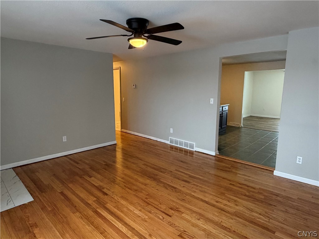 8587 Caughdenoy Road Clay, NY 13041 - Photo 2 of 21 Entryway into the spacious living room