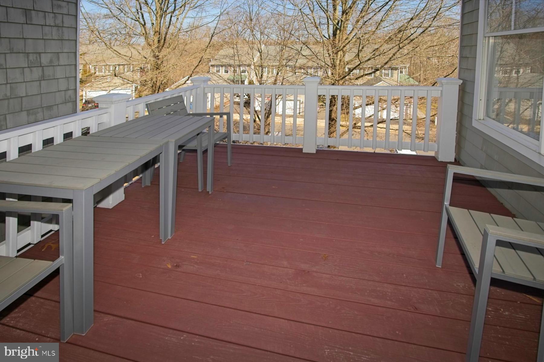 11117 Little Compton Drive Reston, VA 20191 - Photo 12 of 58 Sunny deck with wooded and water views