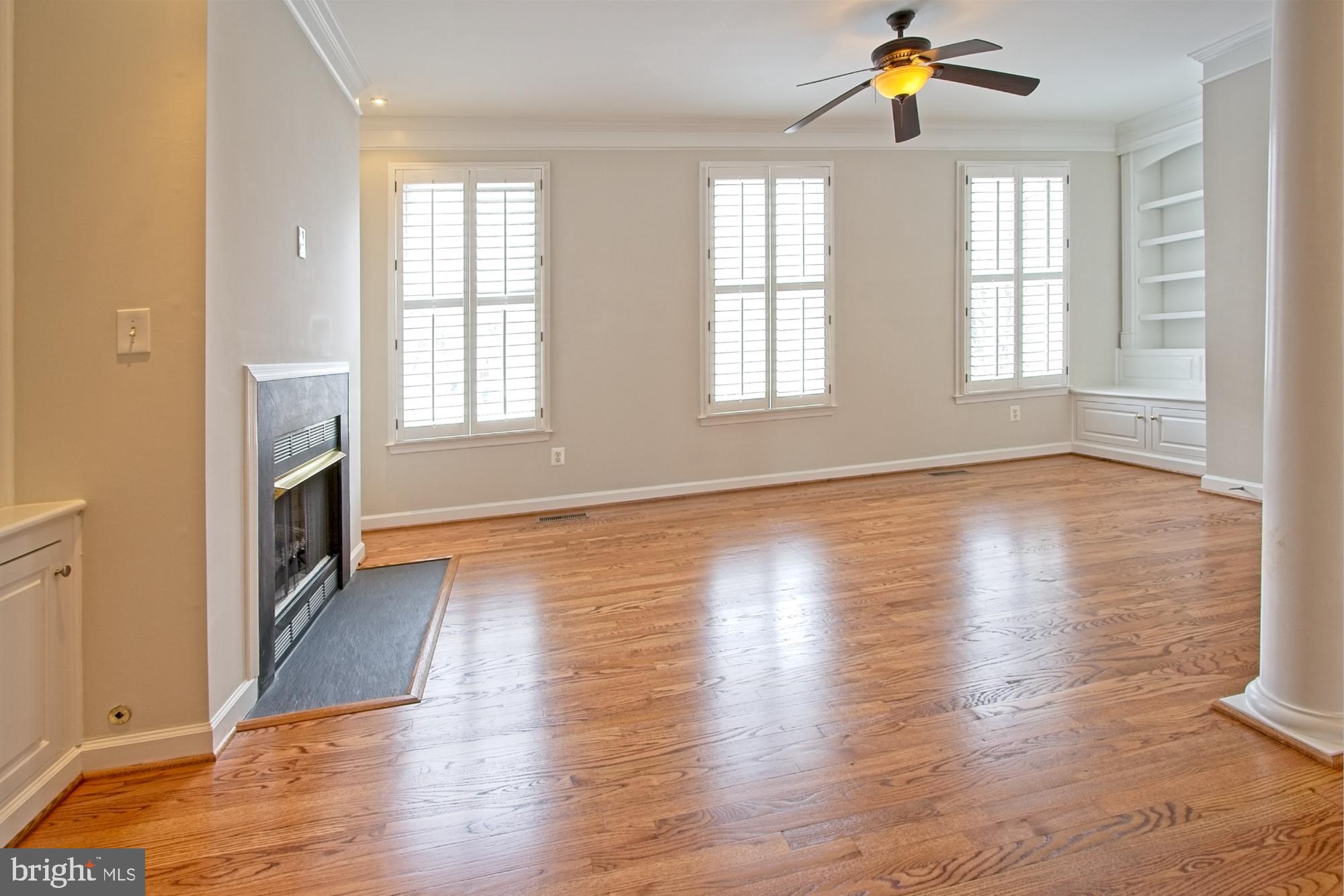 11117 Little Compton Drive Reston, VA 20191 - Photo 16 of 58 The living room offers custom display spaces