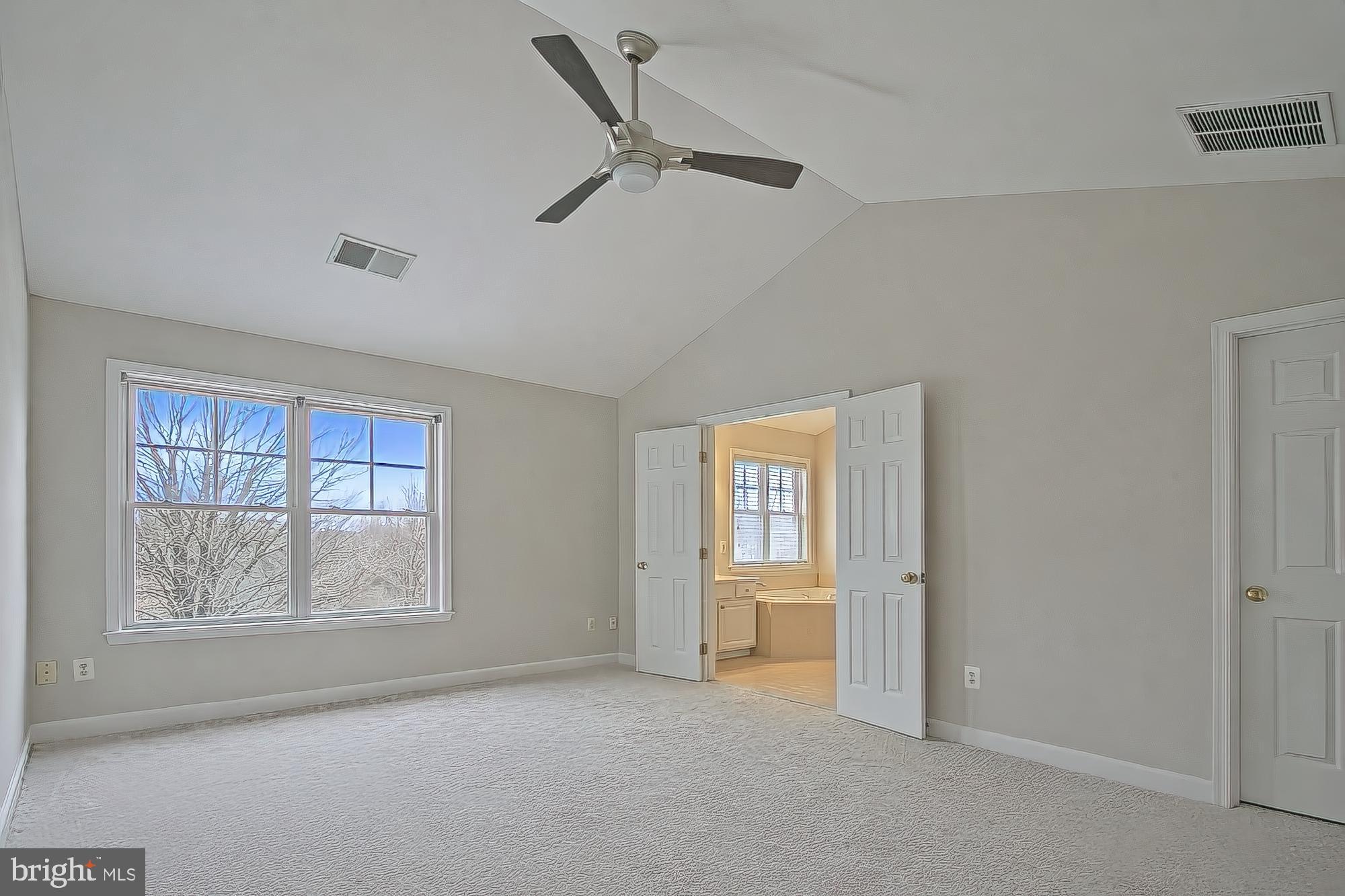 11117 Little Compton Drive Reston, VA 20191 - Photo 25 of 58 Spacious primary bedroom with serene views.