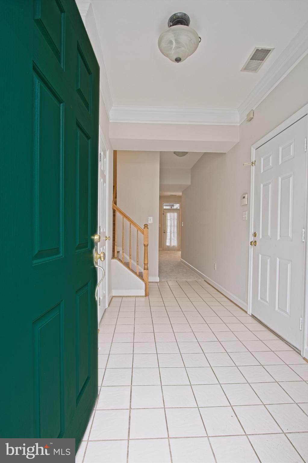 11117 Little Compton Drive Reston, VA 20191 - Photo 3 of 58 Inviting ceramic foyer with classic charm