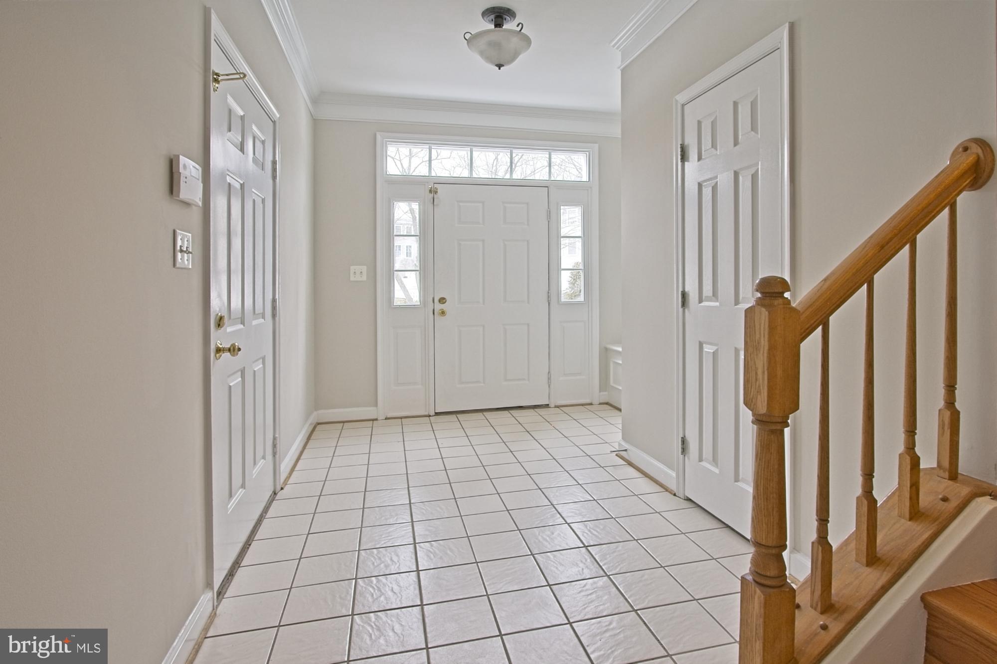 11117 Little Compton Drive Reston, VA 20191 - Photo 4 of 58 Foyer accesses garage and stairs to upper levels