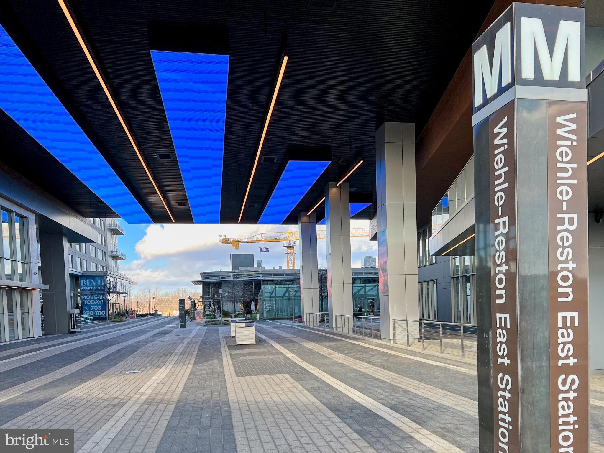 11117 Little Compton Drive Reston, VA 20191 - Photo 57 of 58 Modern transit hub with vibrant architecture.