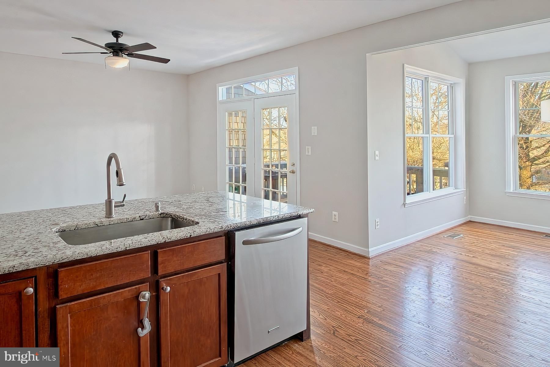 11117 Little Compton Drive Reston, VA 20191 - Photo 8 of 58 Ceiling fan in adjoining family room