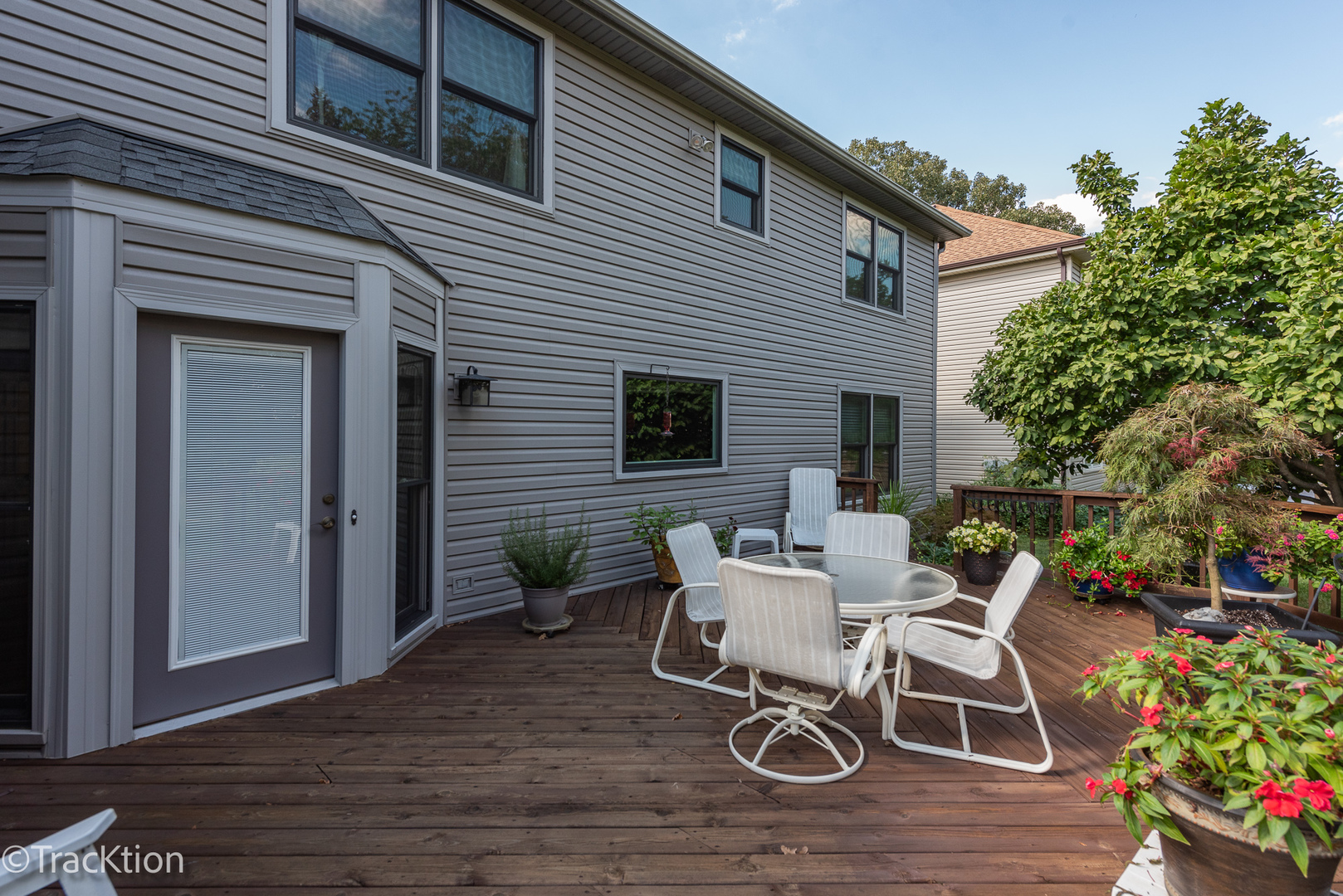 1740 Mundelein Road Naperville, IL 60565 - Photo 29 of 32 a view of a patio with table and chairs and potted plants