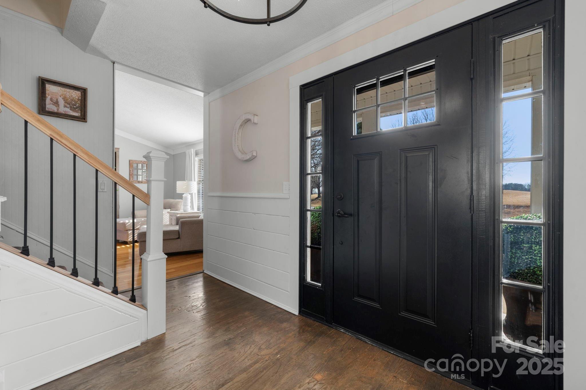 20 Meandering Way Granite Falls, NC 28630 - Photo 15 of 39 a view of a hallway with wooden floor and staircase
