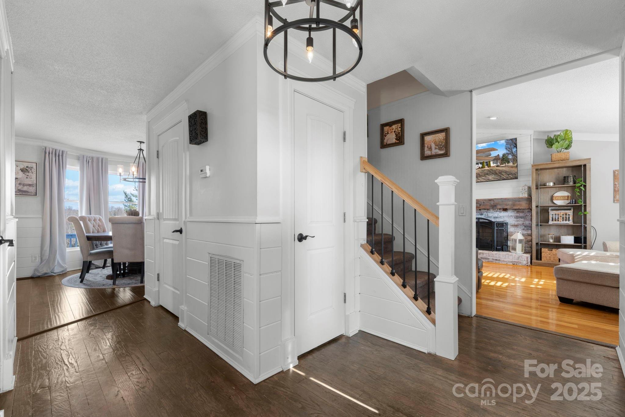 20 Meandering Way Granite Falls, NC 28630 - Photo 16 of 39 a view of a hallway with wooden floor and windows