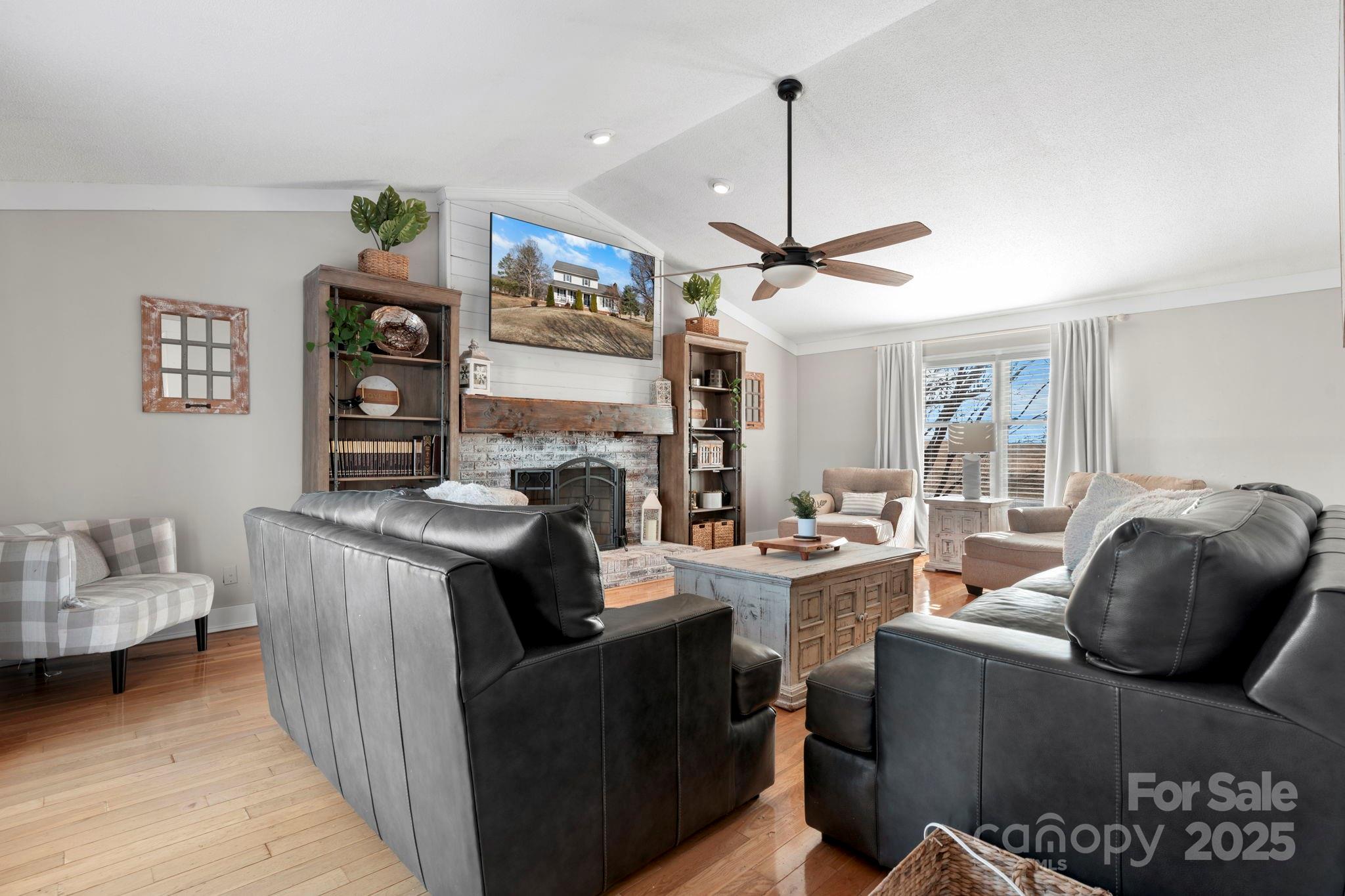 20 Meandering Way Granite Falls, NC 28630 - Photo 18 of 39 a living room with furniture a window and a ceiling fan