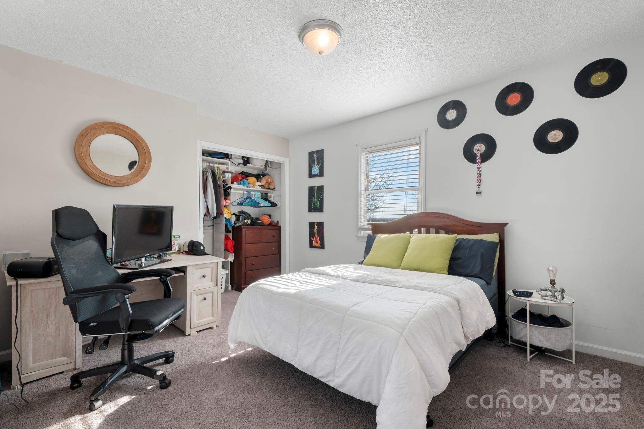 20 Meandering Way Granite Falls, NC 28630 - Photo 32 of 39 a bed room with a bed window and a chair