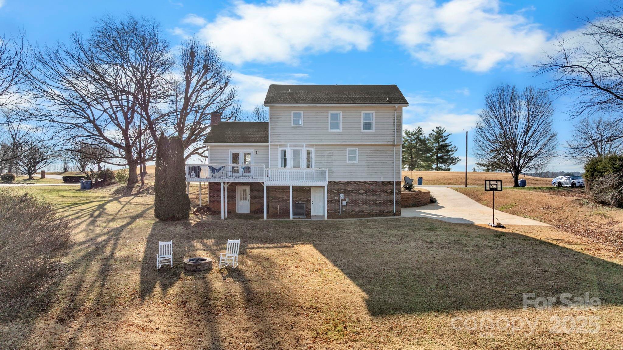 20 Meandering Way Granite Falls, NC 28630 - Photo 4 of 39 a view of a house with a yard covered with snow