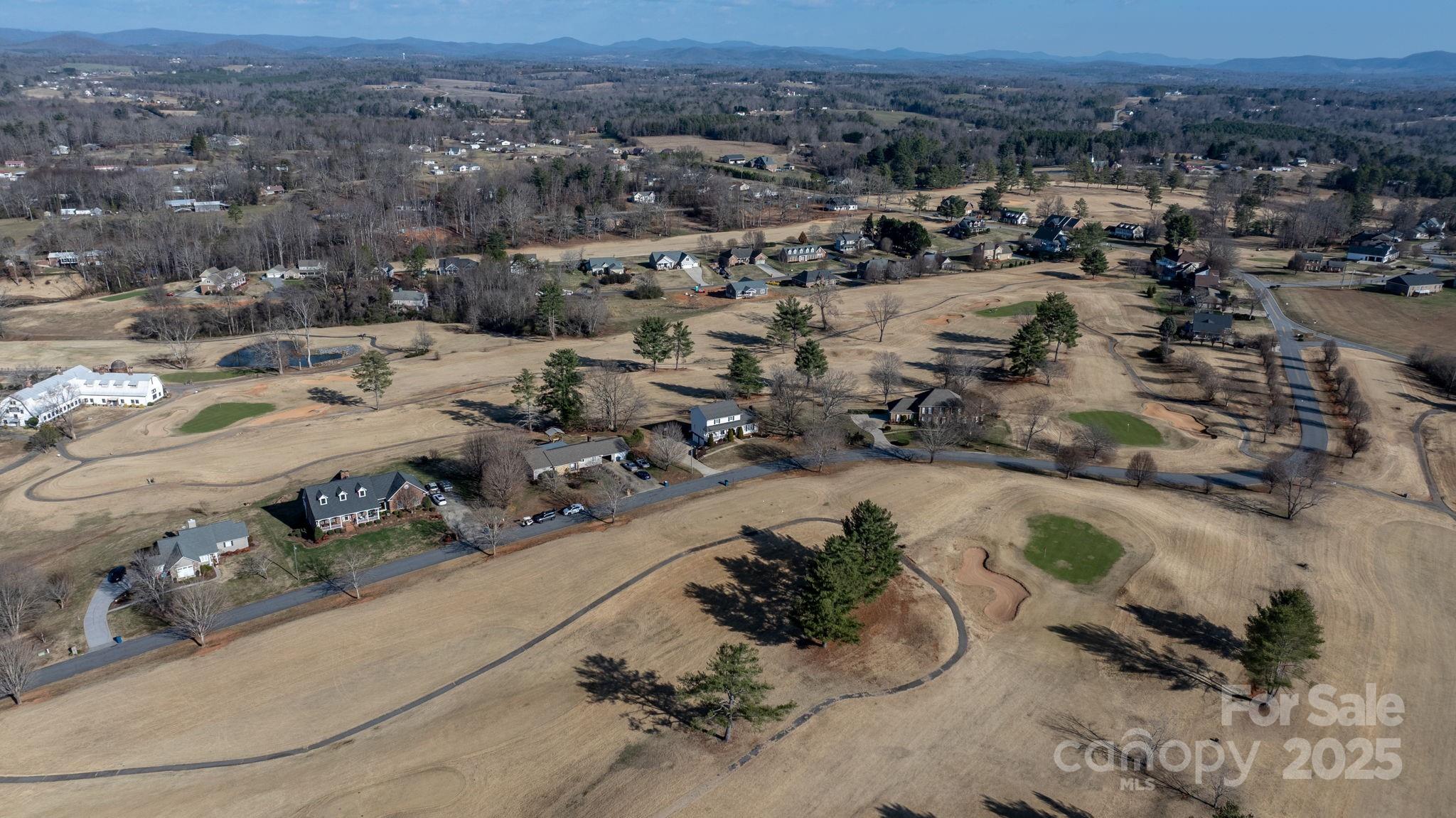 20 Meandering Way Granite Falls, NC 28630 - Photo 10 of 39 an aerial view of a house with a yard and lake view