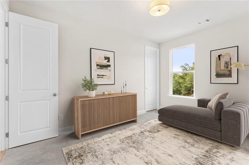 6944 Melody Ridge Road Buford, GA 30518 - Photo 16 of 24 a bedroom with furniture and a window