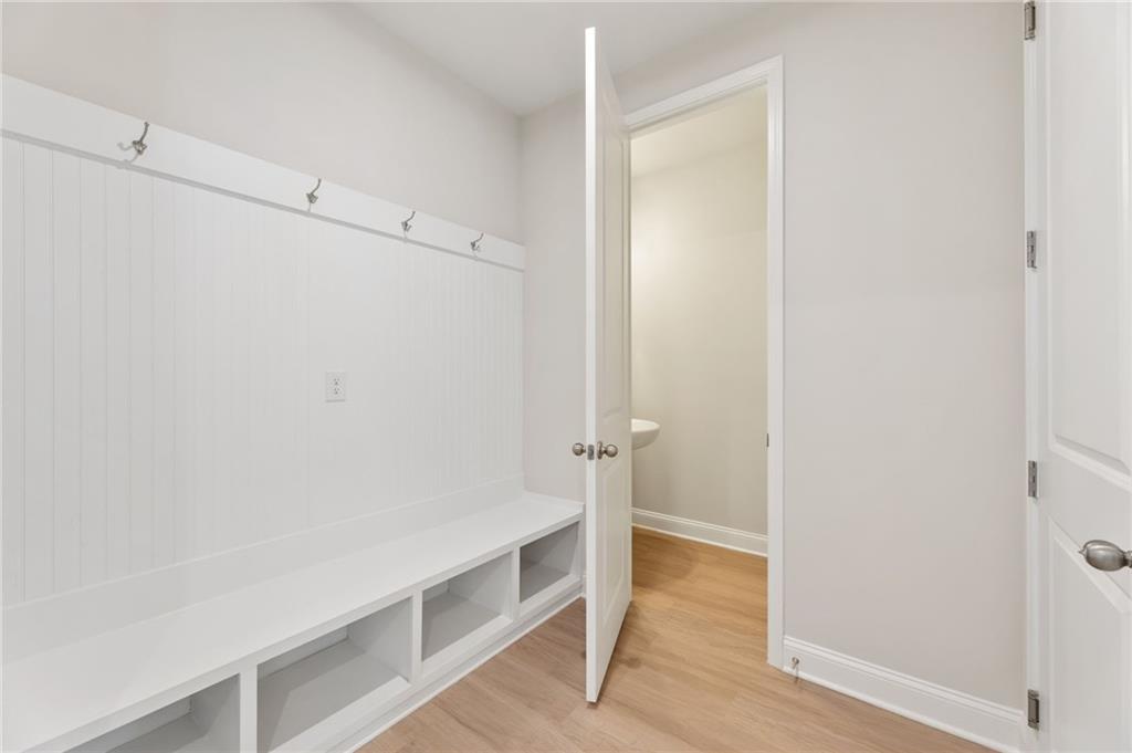 6944 Melody Ridge Road Buford, GA 30518 - Photo 9 of 24 a view of an empty walk in closet