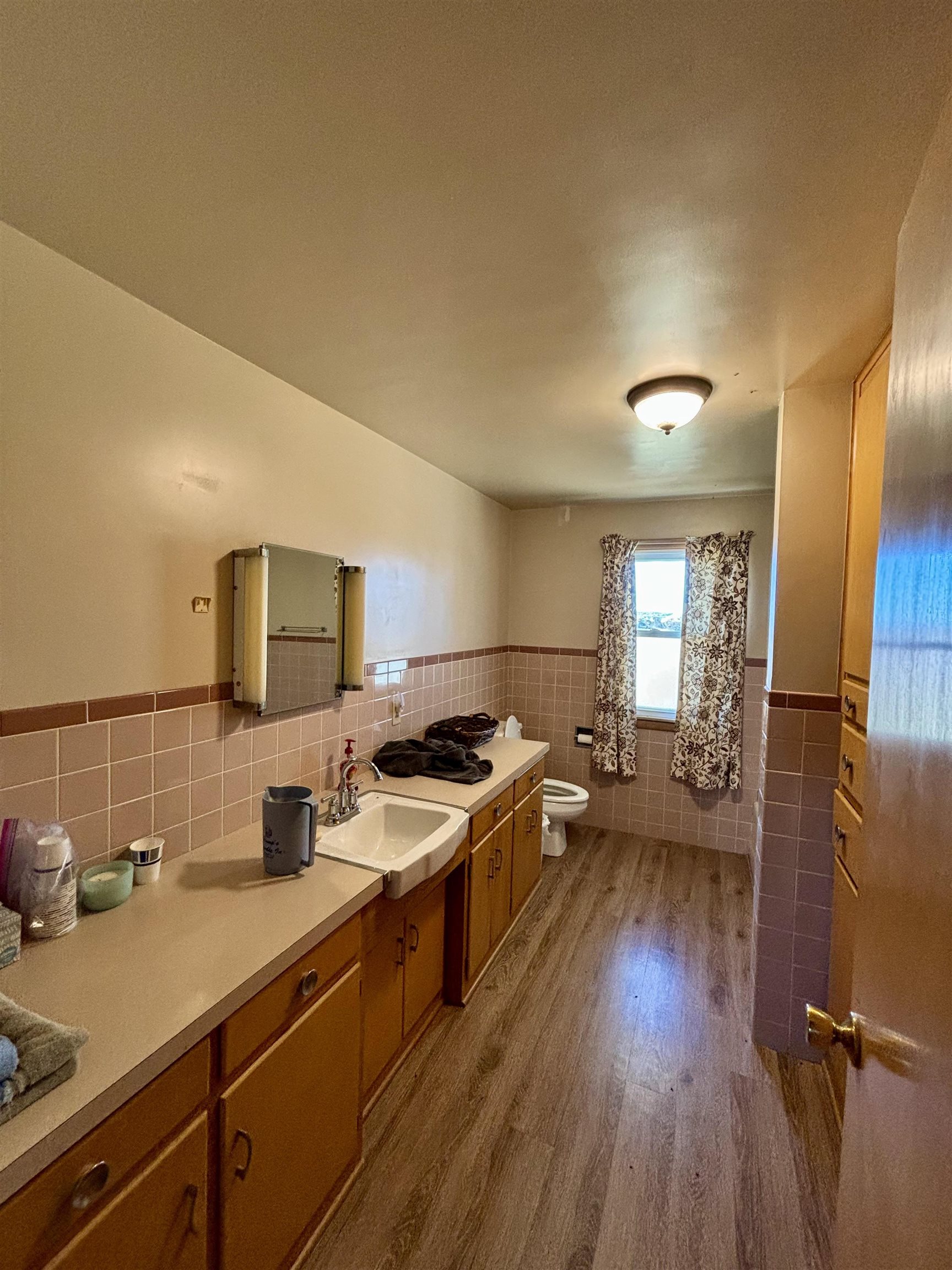 5201 South Burton Road Elizabeth, IL 61028 - Photo 75 of 93 a kitchen with a stove a sink and a refrigerator