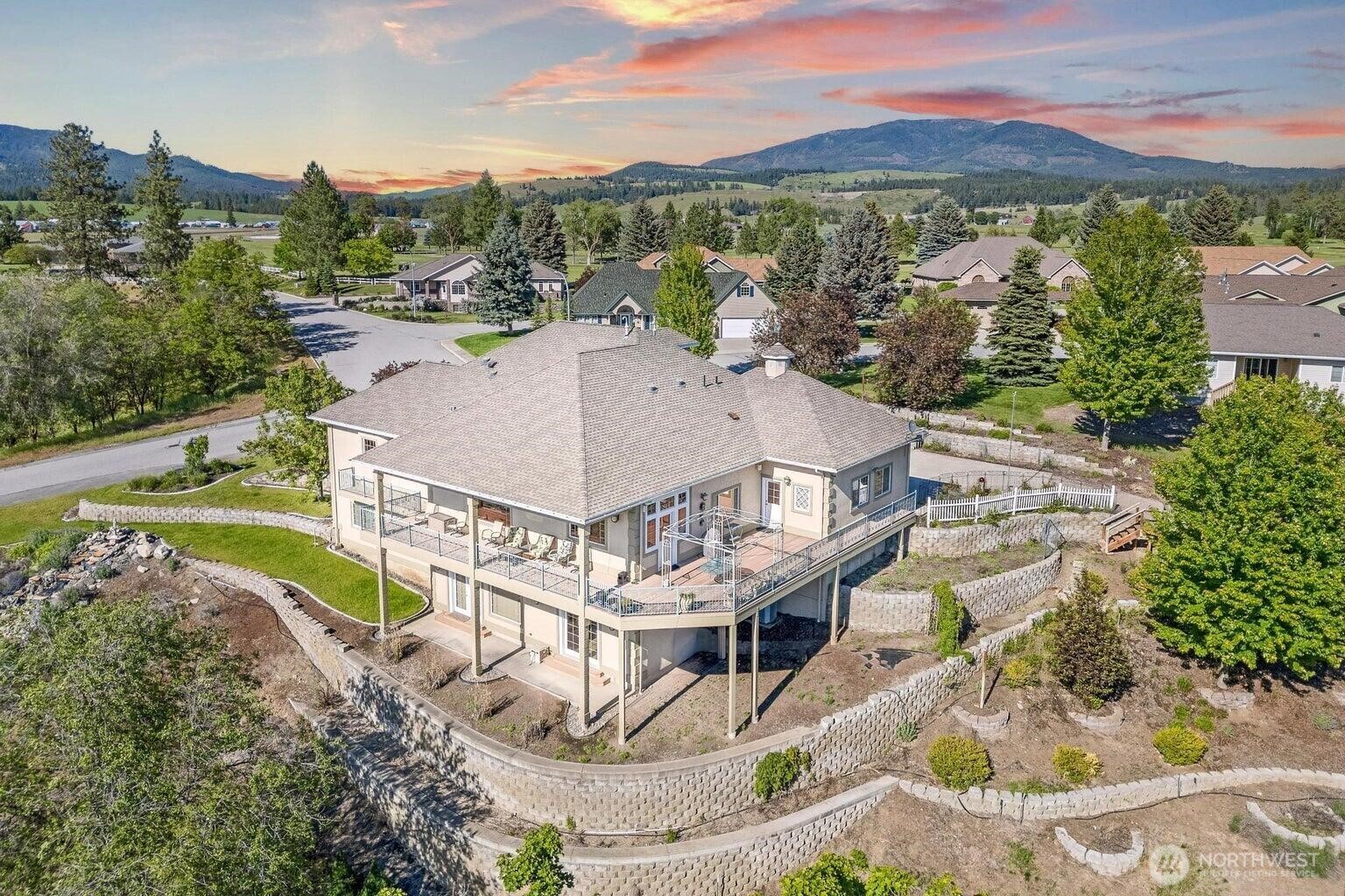 1650 East Fairway Loop Road Colville, WA 99114 - Photo 29 of 30 an aerial view of a house with a garden