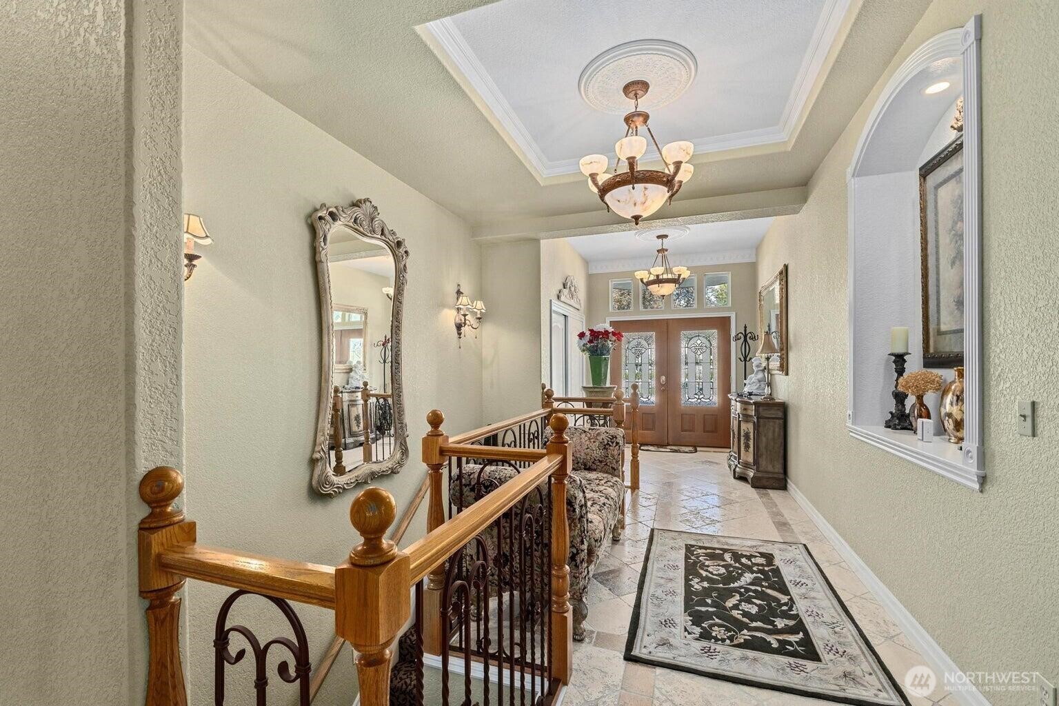 1650 East Fairway Loop Road Colville, WA 99114 - Photo 3 of 30 a view of a hallway to a livingroom with furniture
