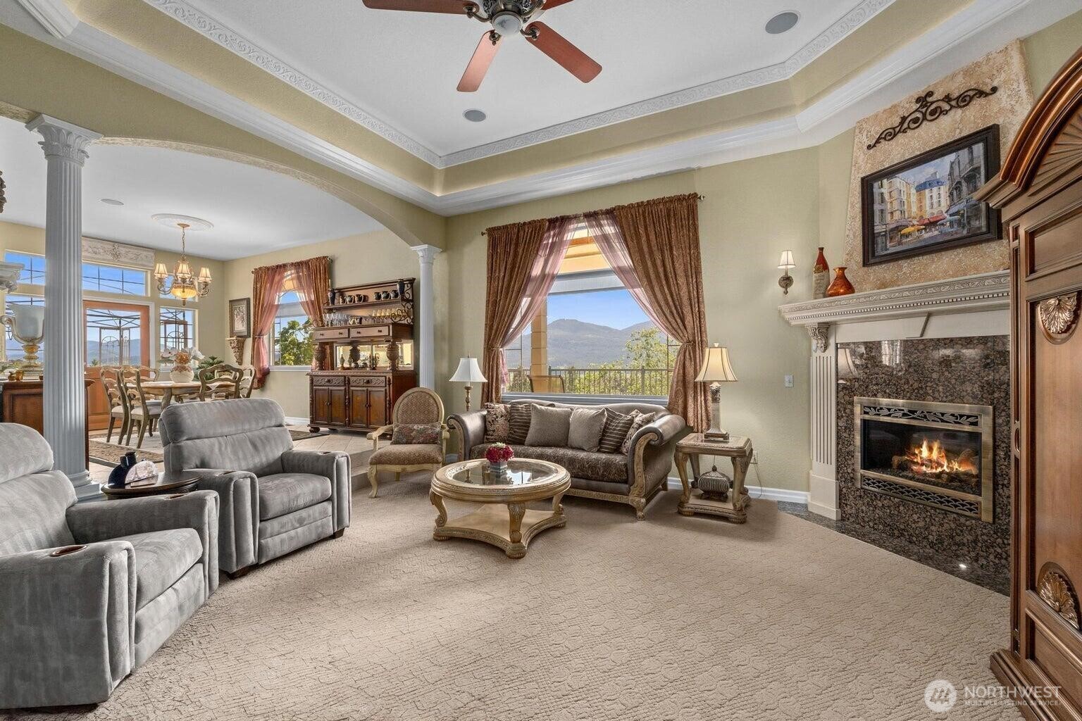 1650 East Fairway Loop Road Colville, WA 99114 - Photo 5 of 30 a living room with furniture and a fireplace