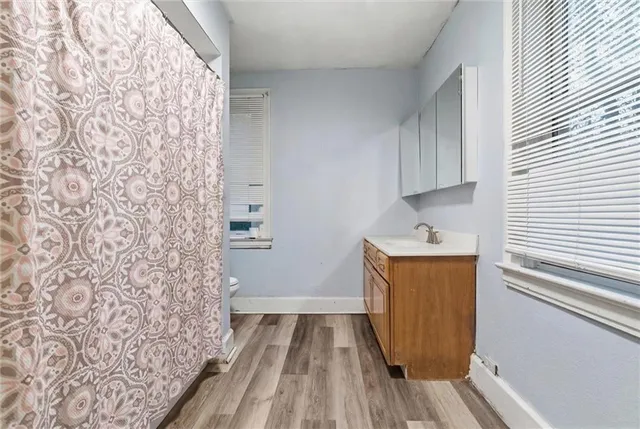 a view of storage and utility room with washer and dryer