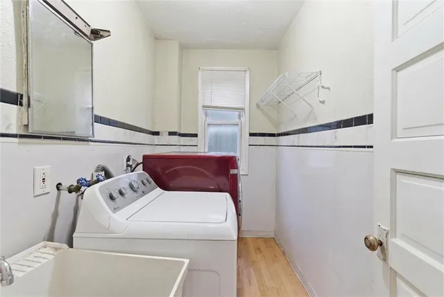 a utility room with dryer and washer