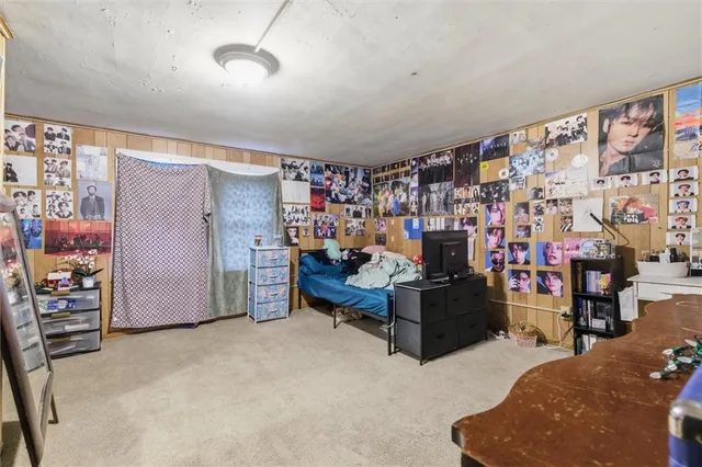 a bedroom with furniture and a couch