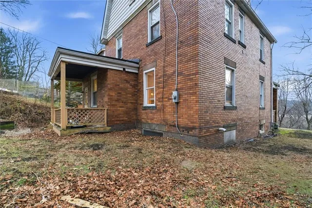 a view of balcony with wooden floor