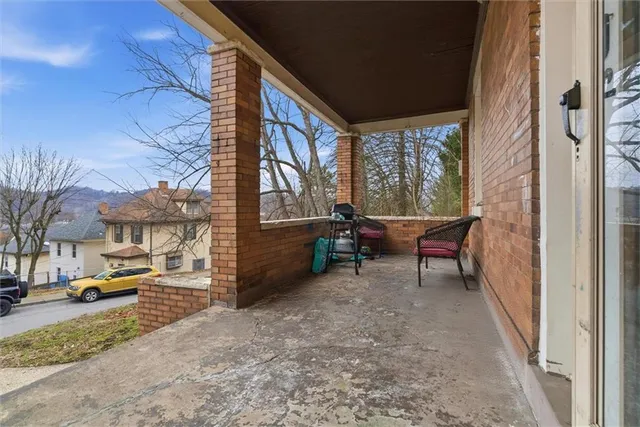 a aerial view of a house with a big yard