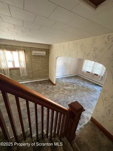 a view of an empty room with window