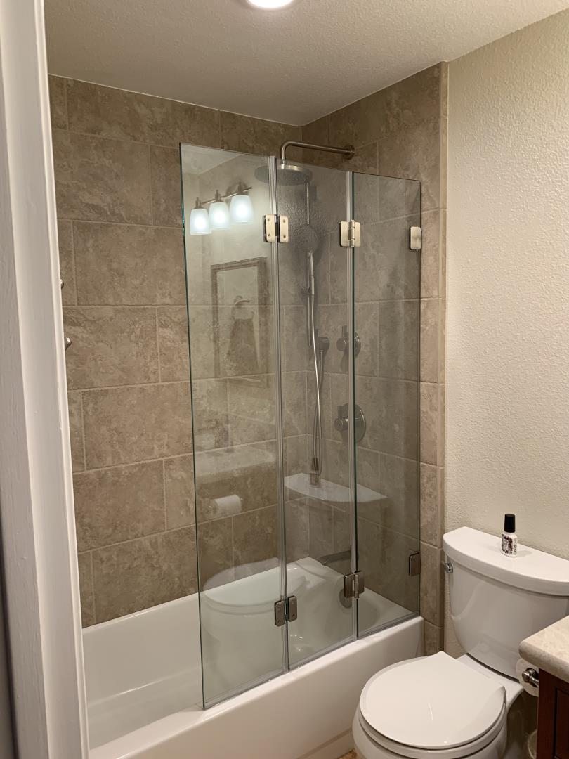 1133 Apache Court Gilroy, CA 95020 - Photo 11 of 15 a bathroom with a shower and toilet