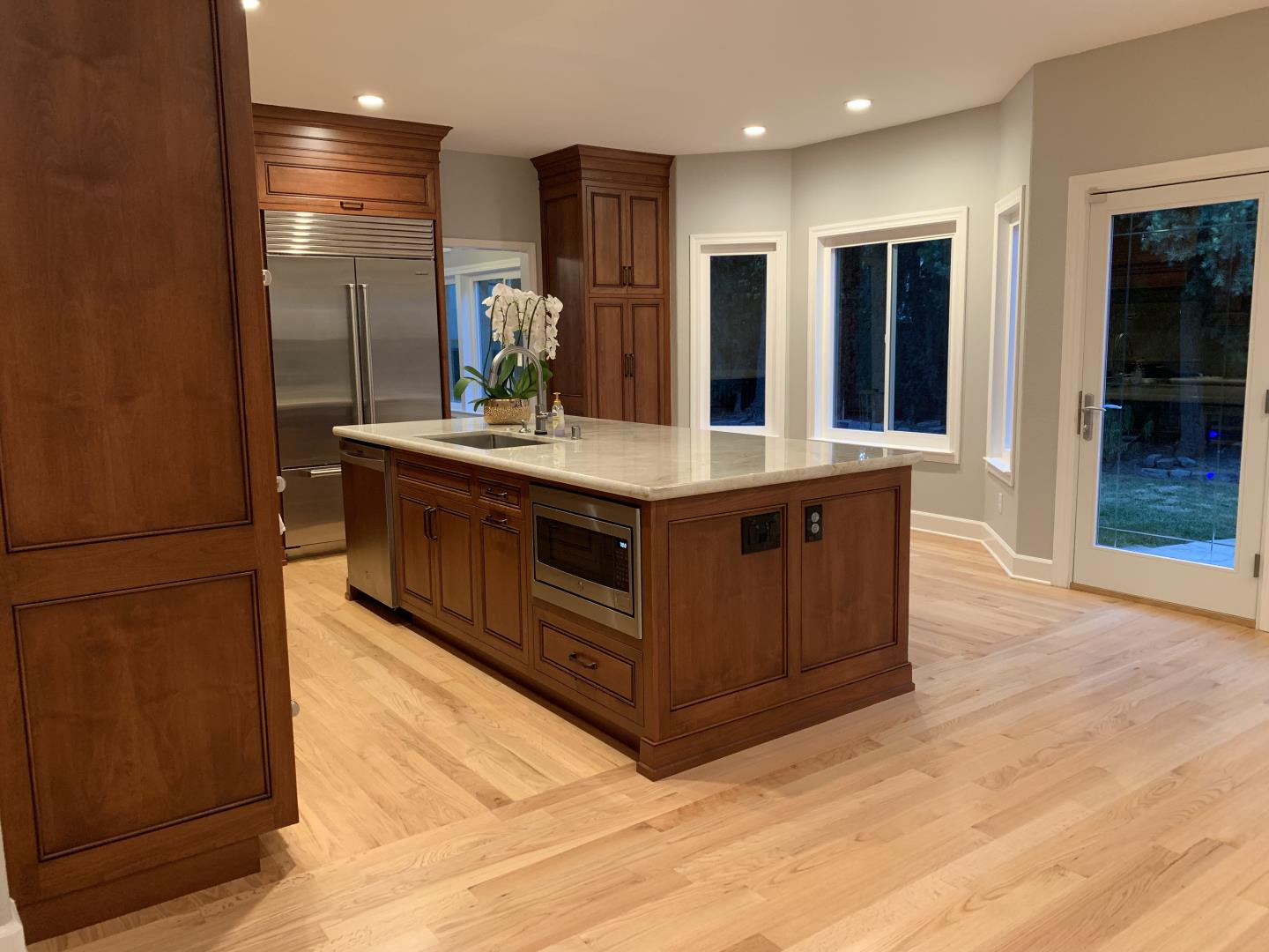 1133 Apache Court Gilroy, CA 95020 - Photo 13 of 15 a kitchen with kitchen island granite countertop a stove and a refrigerator