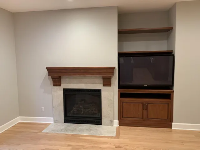 a living room with a fireplace