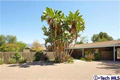 Undisclosed Address Pasadena, CA 91103 - Photo 15 of 15 a front view of a house with a yard