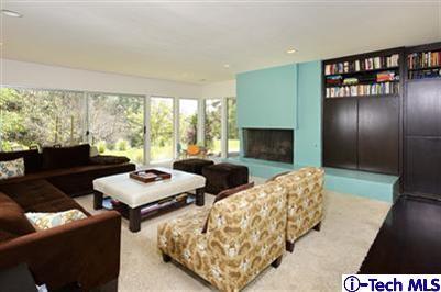 Undisclosed Address Pasadena, CA 91103 - Photo 2 of 15 a living room with couches and a fireplace