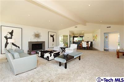 Undisclosed Address Pasadena, CA 91103 - Photo 5 of 15 a living room with furniture and a fireplace