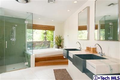 Undisclosed Address Pasadena, CA 91103 - Photo 7 of 15 a bathroom with a tub sink and shower
