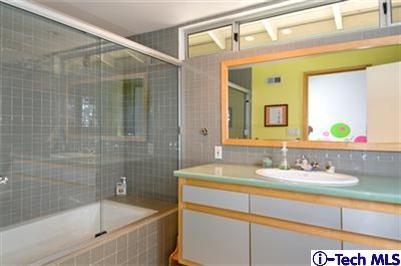 Undisclosed Address Pasadena, CA 91103 - Photo 8 of 15 a bathroom with a sink and a mirror