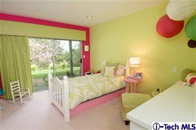 Undisclosed Address Pasadena, CA 91103 - Photo 10 of 15 a bed room with a bed and a window