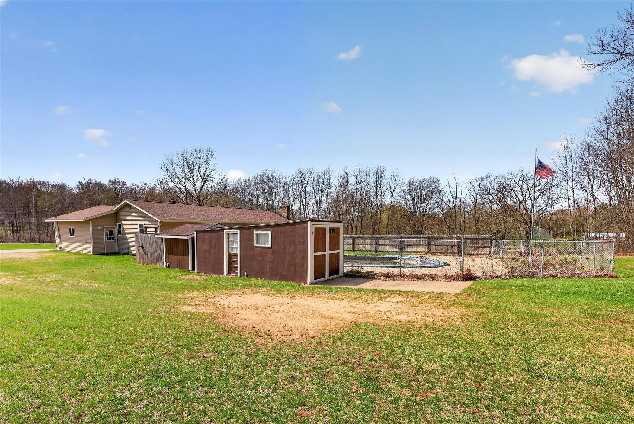 7045 17 Mile Road Northeast Cedar Springs, MI 49319 - Photo 49 of 72 50-7045-17-Mile-Rd-NE-WindowStill-Photog