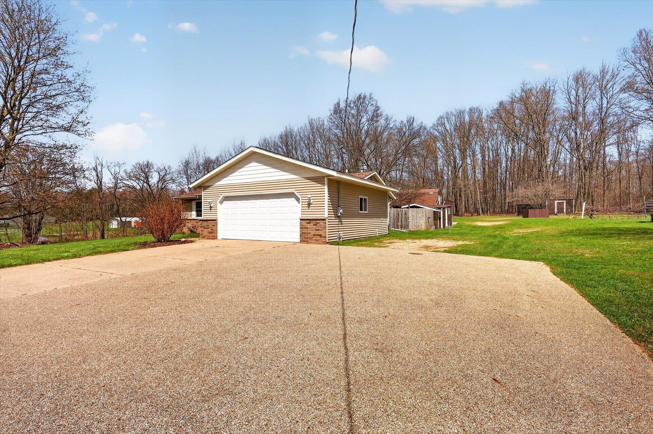 7045 17 Mile Road Northeast Cedar Springs, MI 49319 - Photo 5 of 72 04-7045-17-Mile-Rd-NE-WindowStill-Photog