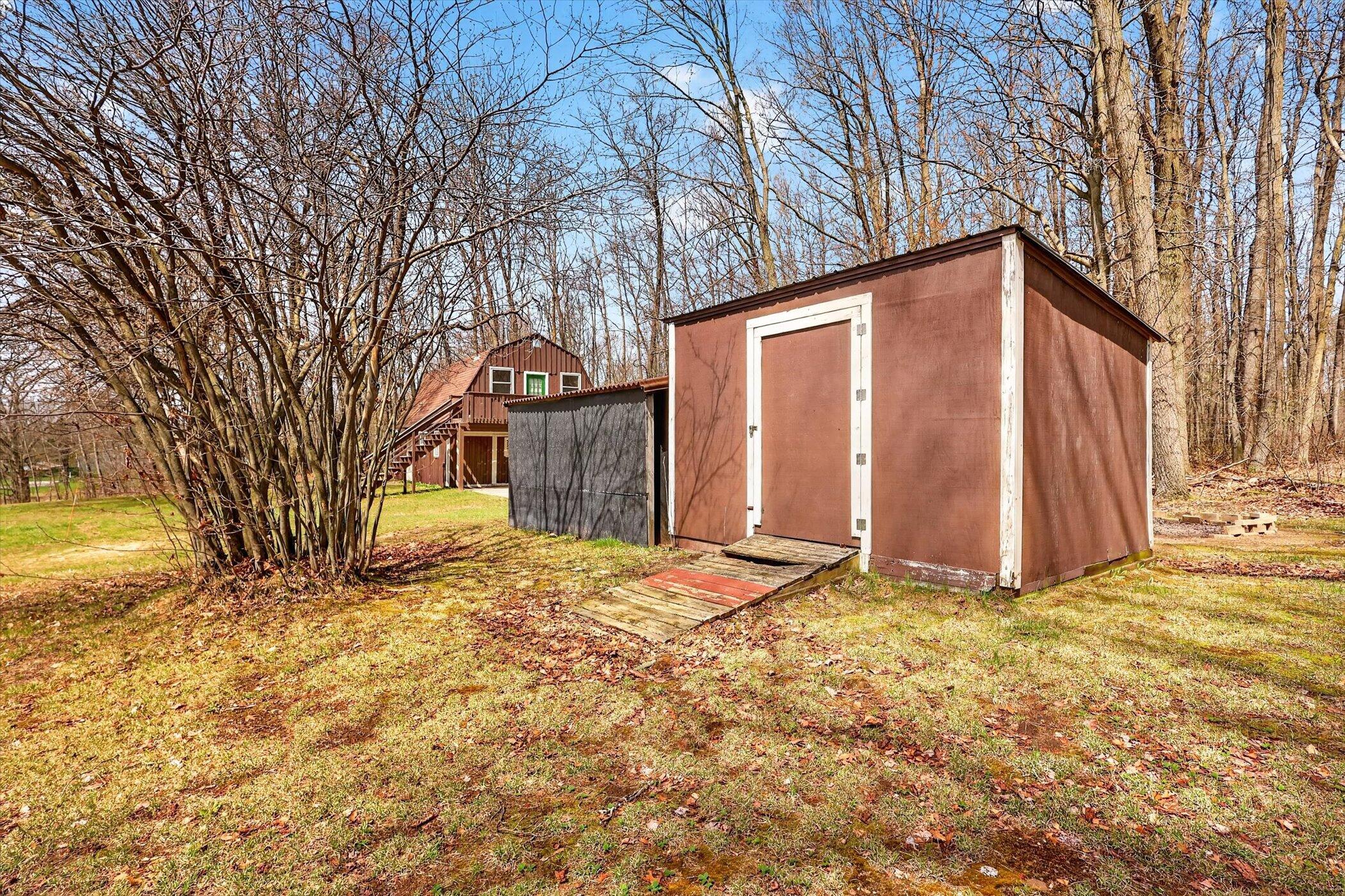 7045 17 Mile Road Northeast Cedar Springs, MI 49319 - Photo 56 of 72 49-7045-17-Mile-Rd-NE-WindowStill-Photog